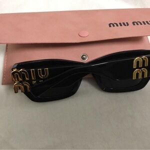 Miu Miu Black Sunglasses with Gold Logo Hardware